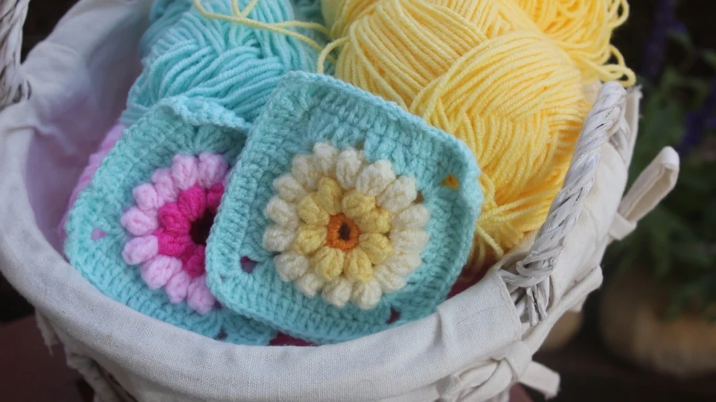 Flower Granny Squares in a basket of yarn